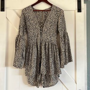 Leopard romper one size (more of a medium)
